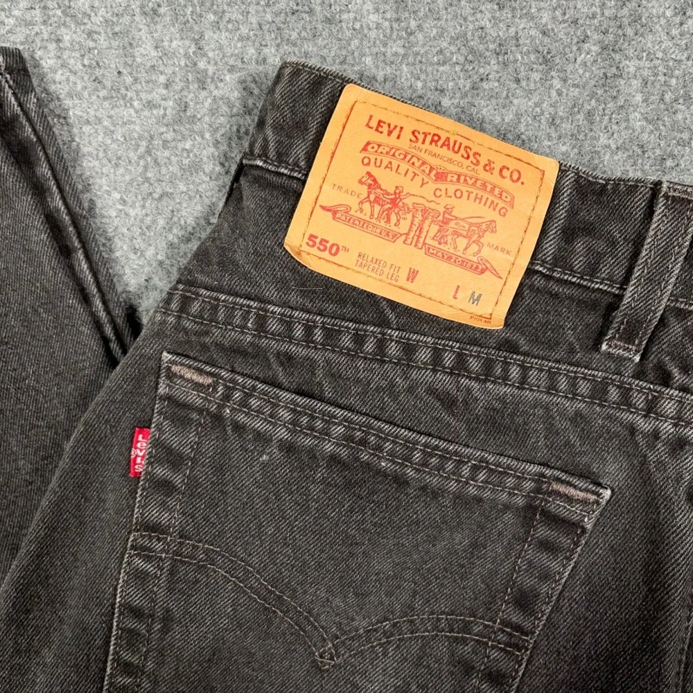 VTG Levi's 550 Relaxed Fit Tapered Leg Jeans Mens 31x31 Black Made‎ In USA Faded
